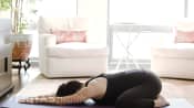 Pregnant women doing the back stretch