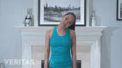 Woman performing the lateral neck extension stretch