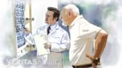 Patient and doctor reviewing CT images.