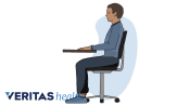 Profile view of man using proper sitting posture